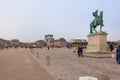 Versailles, France - 10.01.2019: Equestrian statue of Louis XIV on Place d`Armes in front of Palace of Versailles. Palace Royalty Free Stock Photo