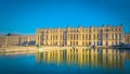 Versailles Palace in front of a pond with reflections near Paris, France Royalty Free Stock Photo