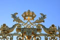 Versailles, Paris, France, June 30, 2022. Gorgeous detail of the golden gate of the royal palace. The late afternoon light Royalty Free Stock Photo