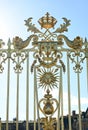 Versailles, Paris, France, June 30, 2022. Gorgeous detail of the golden gate of the royal palace. The late afternoon light Royalty Free Stock Photo
