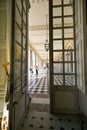 Versailles, Paris, France, June 2022. Stunning viewpoint shot from inside the Peristyle of the Grand Trianon with wide angle lens Royalty Free Stock Photo