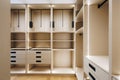 Versatile closet featuring modular storage and integrated illumination Royalty Free Stock Photo