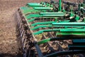 Versatile cultivator with disk, cultivate, harrow tools for secondary tillage - agricultural preparation of soil by mechanical Royalty Free Stock Photo