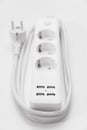 a versatile modern white extension cord with sockets and usb ports