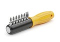 Versatile yellow handle screwdriver with multiple interchangeable metal bits for various tasks Royalty Free Stock Photo