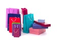 Versicolored and bright shopping packages and boxes isolated on