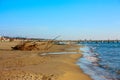 The Versilia beach, a sandy expanse of soft and warm colors in front of the Apuan Alps. The silence of winter, no one in the cold