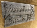 A wooden sign showing where the Byzantine Road starts at Louki`s cafÃÂ© in Lefkes