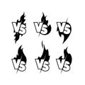 Versus sign surrounded by flames. Black and white symbol.