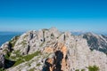 Vertatscha - Hiking trails with scenic view of majestic mountain peak Hochstuhl (Stol) in untamed Karawanks Royalty Free Stock Photo