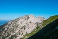 Vertatscha - Hiking trails with scenic view of majestic mountain peak Hochstuhl (Stol) in untamed Karawanks Royalty Free Stock Photo