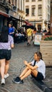 Vertcial shot of people and tourists exploring the cultural city of Brussels, Belgium