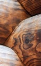 vertical abstract background of interweaving of old logs of light brown color with beautiful patterns of natural lines