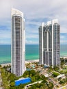 Vertical aerial drone photo Trump Towers Sunny Isles Beach FL