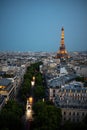 Vertical aerial view of the glowing Eiffel Tower over the skyline of Paris, France Royalty Free Stock Photo