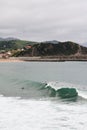 Vertical aerial view of a group of surfers in the ocean on the Cote Basque