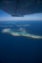 Vertical aerial view islands surrounded by blue ocean