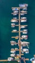 Vertical aerial view of row of docked boats at the Roche Harbor in San Juan island