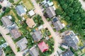 Vertical aerial view of a suburban settlement in Germany with detached houses, close neighbourhood and gardens in front of the hou