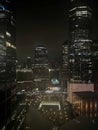 Vertical aerial World Trade Center memorial at night New York City
