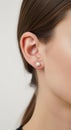 Modern Pearl Stud Earrings on Faceless Model â AI Generated Close-Up Royalty Free Stock Photo