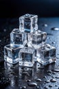 Vertical Arrangement of Melting Ice Cubes on a Wet Dark Surface frozen cold Royalty Free Stock Photo