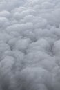 Vertical background of fluffy clouds with grey hue resembling smoke Royalty Free Stock Photo