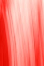 Pretty background image of vertical curving lines in coral and white