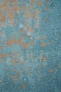 Vertical background old cracked paint on fence, primer orange, peeling paint green Royalty Free Stock Photo