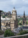 Vertical balcony view of Balmoral clock tower and Edinburgh cityscape in Scotland