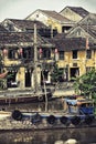 Vertical beautiful shot of buildings and boats in Hoi An, Vietnam