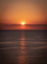 Vertical beautiful shot of sunset over tranquil sea