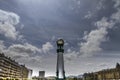 Vertical of the beautiful and unique pillar lamp of the La Zurriola Bridge under the blue sky Royalty Free Stock Photo