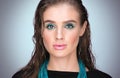 Vertical beauty closeup portrait of young beautiful woman with wet hair