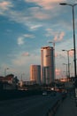 Vertical of Belgrade skyline at sunset purple clouds blue sky background street lamps