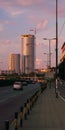 Vertical of Belgrade skyline at sunset purple clouds sky background street lamps