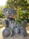 Vertical of big and small Teddy Bear statues in Lakeside park in Texas Royalty Free Stock Photo