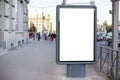 Vertical blank billboard. Mockup of outdoor advertising with copy space on the city street sidewalk Royalty Free Stock Photo