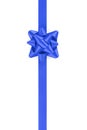 Vertical blue ribbon with gift bow isolated on