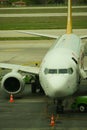 Vertical of Boarding Pegasus airlines plane with ramp on Esenboga airport in Ankara, Turkey