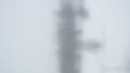 vertical bokeh background of snowfall with shallow depth of field