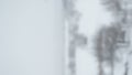 vertical bokeh background of snowfall with shallow depth of field