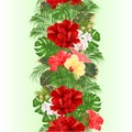 Vertical border seamless background with tropical flowers floral arrangement, with beautiful hibiscus,orchid palm,philodendron a Royalty Free Stock Photo