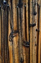 Vertical burned knot and wood grain pattern old fence Royalty Free Stock Photo