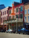 Vertical of cars parked at a restaurant in New Orleans French Quarter, USA Royalty Free Stock Photo