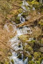 Vertical Cascading Mountain Waterfalls in a Boulder Field