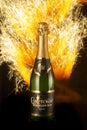 Bottle of Soviet champagne on bursting fireworks backdrop for Christmas