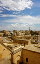 Vertical cityscape of the old town Midyat with its architectural buildings in Mardin, Turkey