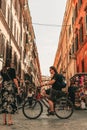 Vertical cityscape with People walking around Rome's alleys and streets