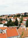 Vertical cityscape view with traditional red-tiled buildings in Eger, Hungary